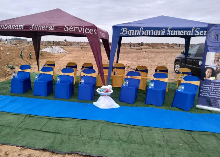 Bambanani branded gazebos and company vehicle at a graveside service