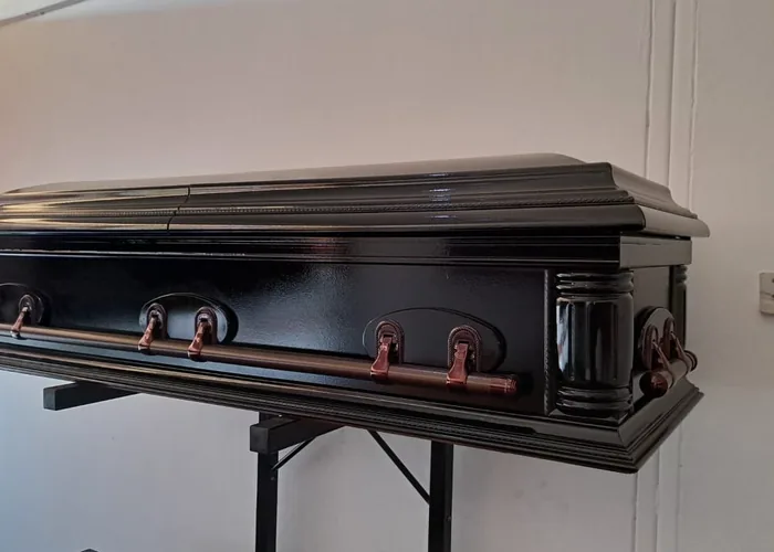 A polished coffin prepared for a service