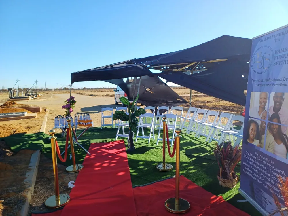 A Bambanani service setup with seating and floral arrangements